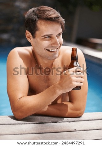 Man, relax and smile in swimming pool with beer to drink or chill on summer vacation, luxury and resort or villa. Male person, bottle and alcohol for refreshments on tropical holiday in Maldives.