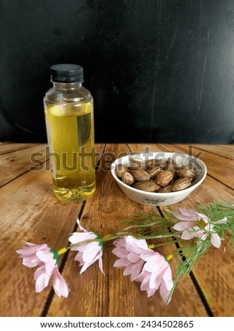 Olive oil, flower and bean on the table