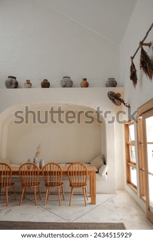 Cozy common area of holiday villa with lots of natural light with simple decoration in Bali