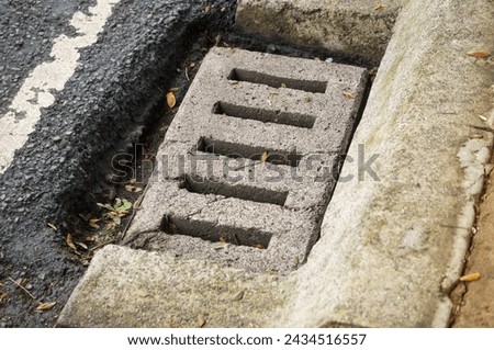 Drainage is the natural or artificial removal of water masses from the surface or subsurface of a place. Royalty-Free Stock Photo #2434516557