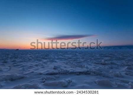 Lake Baikal in winter, the deepest and largest freshwater lake by volume in the world, located in southern Siberia, Russia Royalty-Free Stock Photo #2434530281