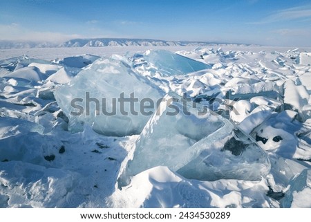 Hummocks on Lake Baikal, the deepest and largest freshwater lake by volume in the world, located in southern Siberia, Russia Royalty-Free Stock Photo #2434530289