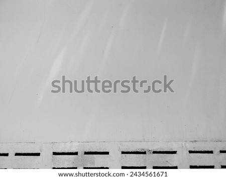 white cement wall Set up a barrier as a boundary fence around the white empty background frame.
