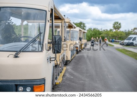 Selective Focus on the Shuttles at Shark Valley Visitor Center in the Everglades National Park. Royalty-Free Stock Photo #2434566205
