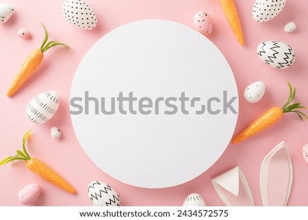 Easter art concept: Top-view photo of minimalist painted eggs, sweet bunny ears, and carrots as Easter Bunny favors on a blush pink background, leaving a round blank space for wording