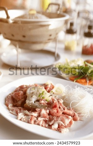 Seafood and meat with vermicelli for  barbecue grill and hot pot street buffet thai style. (Moo Kra Ta). Royalty-Free Stock Photo #2434579923