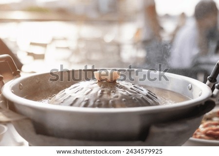 Grill barbecue on pan and hot pot street buffet thai style. (Moo Kra Ta) Royalty-Free Stock Photo #2434579925