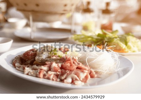 Seafood and meat with vermicelli for  barbecue grill and hot pot street buffet thai style. (Moo Kra Ta). Royalty-Free Stock Photo #2434579929