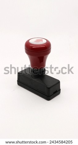 Black wooden rubber stamp isolated on white background