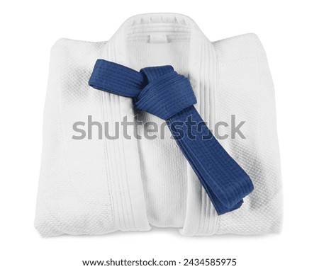 Blue karate belt and kimono isolated on white Royalty-Free Stock Photo #2434585975