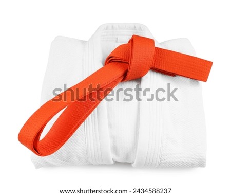 Martial arts uniform with orange belt isolated on white Royalty-Free Stock Photo #2434588237