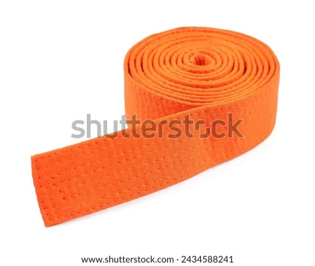 Orange karate belt isolated on white. Martial arts uniform Royalty-Free Stock Photo #2434588241