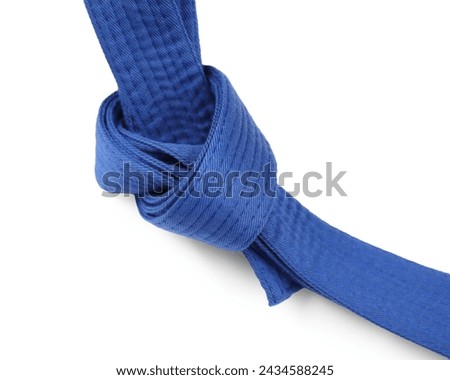 Blue karate belt isolated on white. Martial arts uniform Royalty-Free Stock Photo #2434588245
