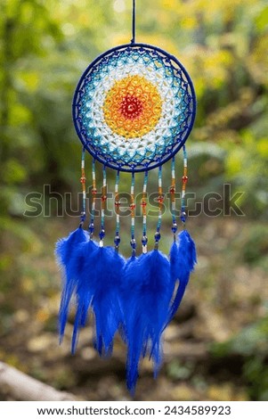 Dream catcher with feathers threads and beads rope hanging. Dreamcatcher handmade