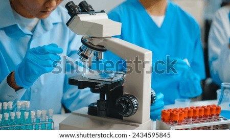 Laboratory tests with a team of people, ensuring precision and accuracy in scientific experiments and analyses, contributing to advancements in various fields. Royalty-Free Stock Photo #2434595845