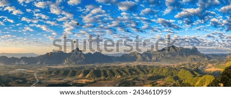 Panorama Picture Vang Vieng Laos, Big Pha Ngern View Point Top, amazing view with air balloons in the air. HDR picture, simple beautiful Royalty-Free Stock Photo #2434610959