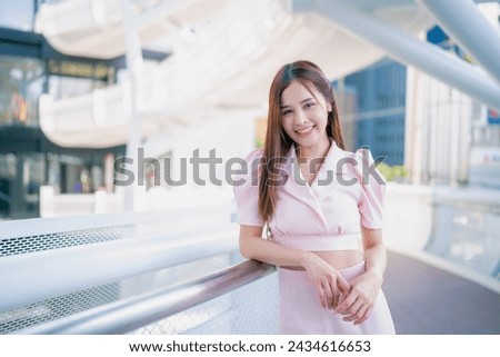 Portrait of beautiful young businesswoman, Closeup face of a pretty asian model, Copy space. Royalty-Free Stock Photo #2434616653