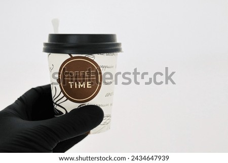 paper coffee cup with coffee time on a white background