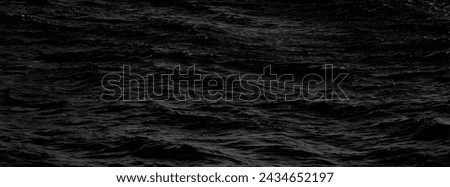 Black panorama sea texture . water reflection texture background. Dark background, High resolution background of dark water or oil surface. Ocean surface dark nature background. Black water texture.