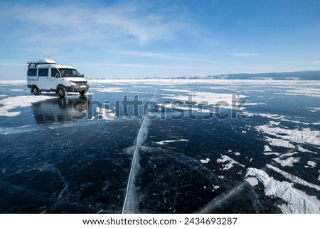 Ice of Lake Baikal, the deepest and largest freshwater lake by volume in the world, located in southern Siberia, Russia Royalty-Free Stock Photo #2434693287