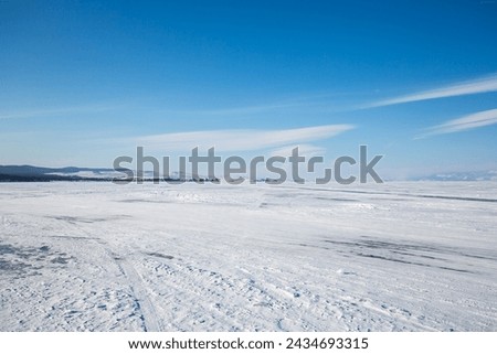 Lake Baikal in winter, the deepest and largest freshwater lake by volume in the world, located in southern Siberia, Russia Royalty-Free Stock Photo #2434693315