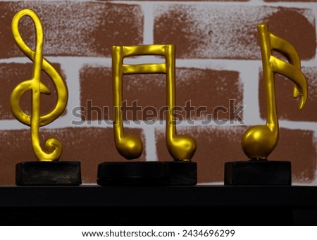 Three Musical Signs - Treble Clef, Double Sixteenth Note, Single Sixteenth Note
