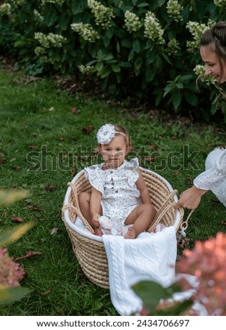 One-Year-Old Girl in a Beautiful Summer Park