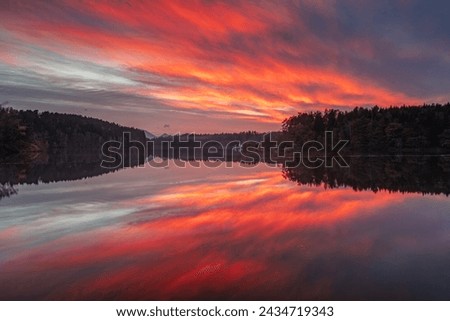 Magic evening dawn at lake 