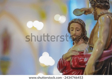 Saint John the Baptist baptizing Jesus Christ Catholic vintage statue Royalty-Free Stock Photo #2434746453