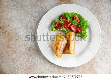 cutlet cordon bleu chicken meat food tasty eating cooking meal food snack on the table copy space food background rustic top view Royalty-Free Stock Photo #2434779703