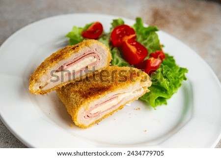 cutlet cordon bleu chicken meat food tasty eating cooking meal food snack on the table copy space food background rustic top view Royalty-Free Stock Photo #2434779705
