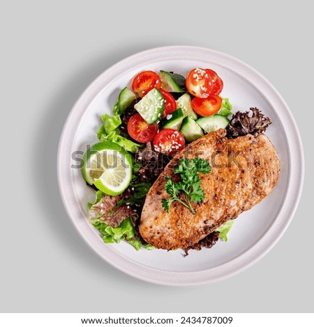 Grilled chicken with vegetables top view isolated