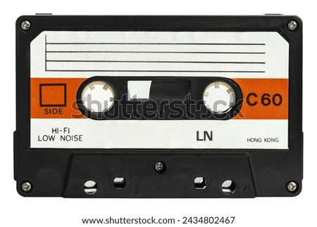 Retro-style cassette tape with blank label on a white background
