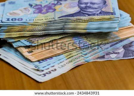 LEI money banknotes, detail photo of RON. Romanian currency Royalty-Free Stock Photo #2434843931