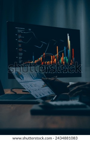 Thoughtful focused successful caucasian male stock investor, broker, financial adviser, sits at work desk, looks at computer, pensively analyze risks and prospects, rise or fall of cryptocurrency coin Royalty-Free Stock Photo #2434881083