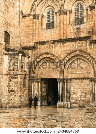 entrance to the Church of the Holy Sepulcher (Latin: Ecclesia Sancti Sepulchri) on a rainy day Royalty-Free Stock Photo #2434884969
