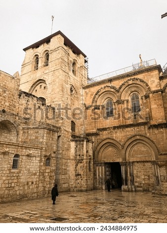 entrance to the Church of the Holy Sepulcher (Latin: Ecclesia Sancti Sepulchri) on a rainy day Royalty-Free Stock Photo #2434884975