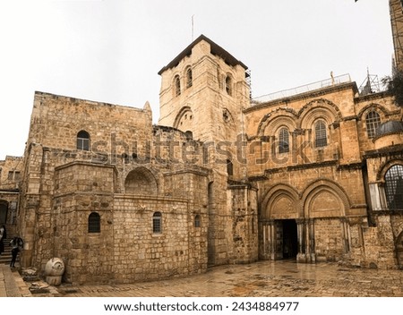 entrance to the Church of the Holy Sepulcher (Latin: Ecclesia Sancti Sepulchri) on a rainy day Royalty-Free Stock Photo #2434884977