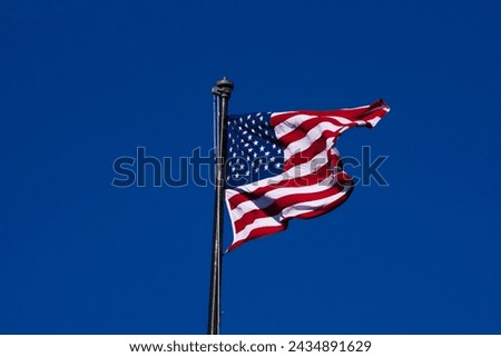 Patriotic image of the American flag on liberty island 