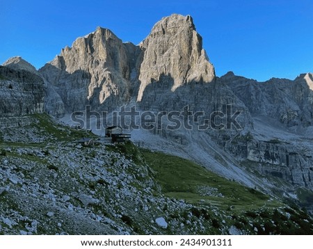 Summit Sentinel: Dolomite Via Ferrata Trail Views in Adamello Brenta, Bocchette, Dolomites Royalty-Free Stock Photo #2434901311