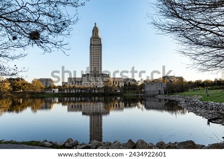 Louisiana State Capitol and Capitol Lake just before dusk Royalty-Free Stock Photo #2434922601