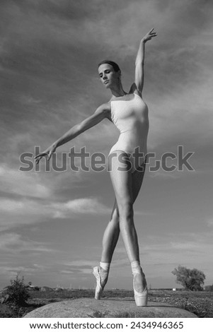 young slim beauty woman ballerina in bodysuit