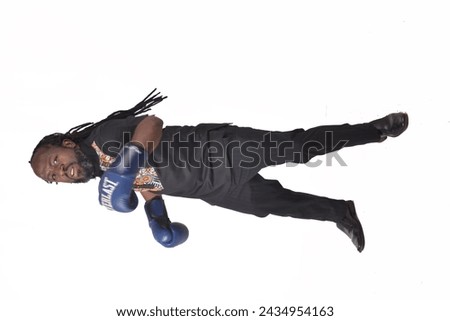 Black dreadlocked rich active royal professional businessman photographed in the studio white background
