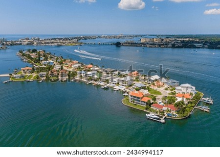 Drone view of luxury coastal Florida intracoastal neighborhood  Royalty-Free Stock Photo #2434994117
