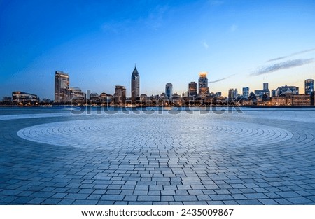 City Square floor and Shanghai skyline with modern buildings at dusk. Famous Bund buildings scenery in Shanghai. 