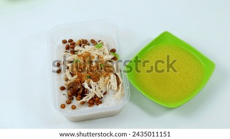 Chicken porridge close up on white background
