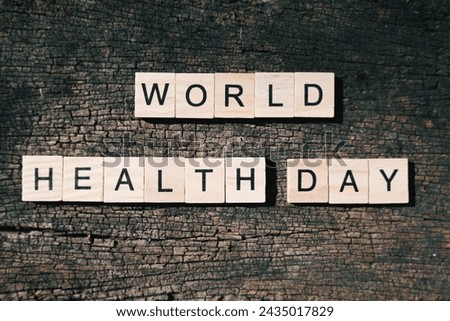 close up world health day wooden text block and stethoscope on table, medical and healthcare, life insurance business technology, global pandemic crisis risk and problem concept