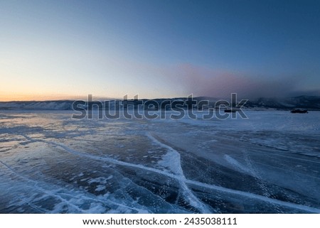 Ice of Lake Baikal, the deepest and largest freshwater lake by volume in the world, located in southern Siberia, Russia Royalty-Free Stock Photo #2435038111