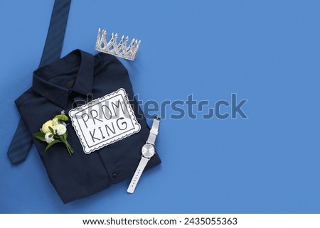 Male shirt with tie, crown and text PROM KING on blue background