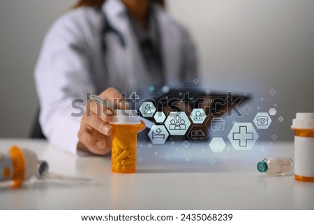 Doctor holding pills bottle in hand with medical icons. Pharmaceutical and health care concept